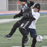 Nikiskis Frank Asibong and Soldotnas Keegan Bross battle for the ball Tuesday, April 22, 2025, at Justin Maile Field at Soldotna High School in Soldotna, Alaska. (Photo by Jeff Helminiak/Peninsula Clarion)