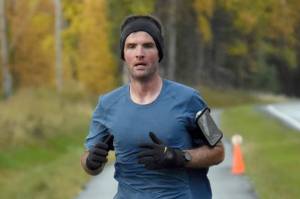 Lee Frey runs to victory in the men's half marathon at the Kenai River Marathon on Sunday, Sept. 25, 2022, in Kenai, Alaska. (Photo by Jeff Helminiak/Peninsula Clarion)