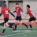 Kenai Centrals Miles Metteer (14) celebrates the game-winning goal against Ketchikan on Wednesday, April 23, 2025, at Ed Hollier Field at Kenai Central High School in Kenai, Alaska. (Photo by Jeff Helminiak/Peninsula Clarion)