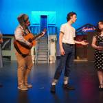 Belle Morris, Jackson Hooper, Kyler Allen and Oshie Broussard rehearse All Shook Up in the Nikiski Middle/High School Auditorium on Saturday, April 26, 2025. (Jake Dye/Peninsula Clarion)