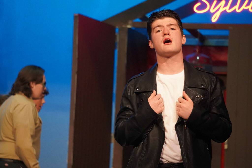 Oliver Parrish rehearses All Shook Up in the Nikiski Middle/High School Auditorium on Saturday, April 26, 2025. (Jake Dye/Peninsula Clarion)