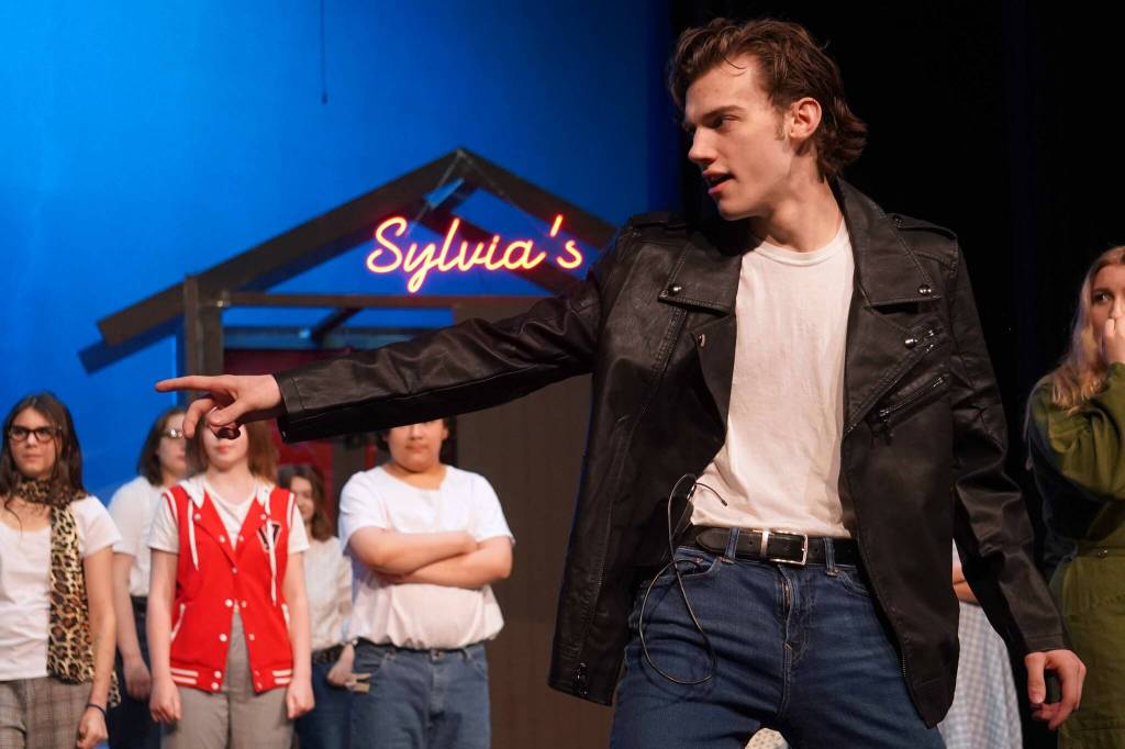 Kyler Allen rehearses All Shook Up in the Nikiski Middle/High School Auditorium on Saturday, April 26, 2025. (Jake Dye/Peninsula Clarion)
