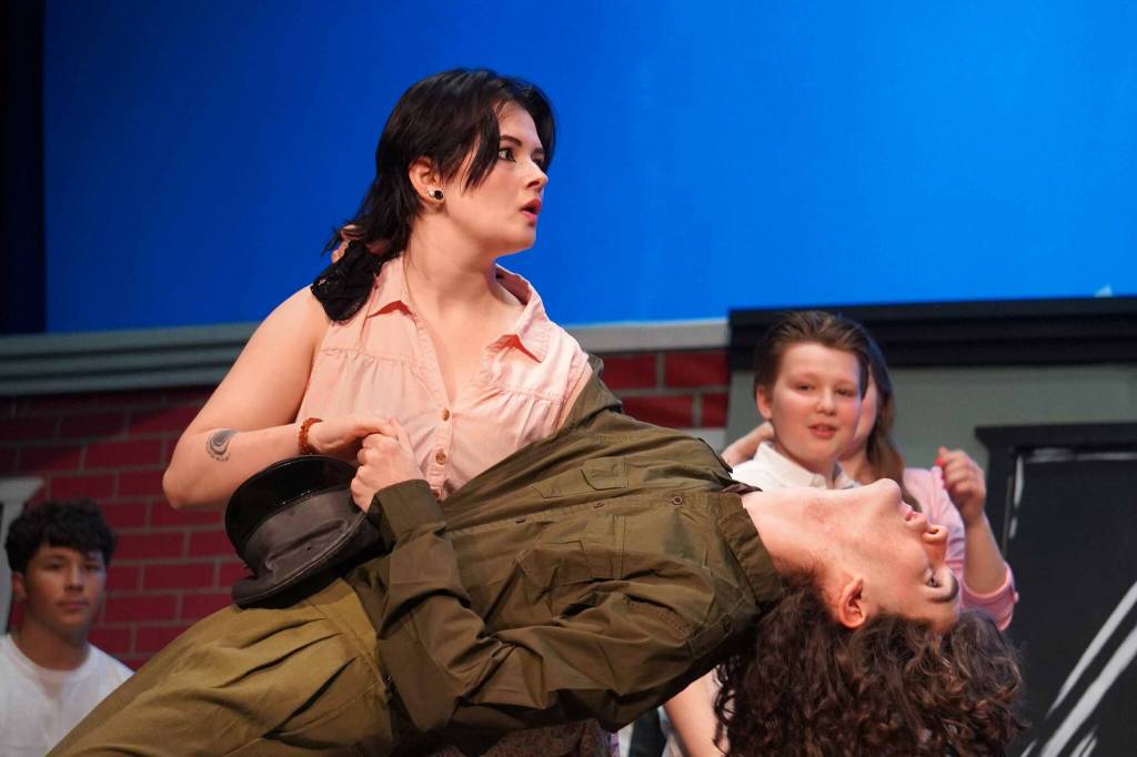 Kry Spurgeon and Kincaid Jenness rehearse All Shook Up in the Nikiski Middle/High School Auditorium on Saturday, April 26, 2025. (Jake Dye/Peninsula Clarion)