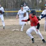 Soldotnas Jett Brophy tags out Daniel Steffensen on Monday, April 28, 2025, at the Soldotna Little League fields in Soldotna, Alaska. (Photo by Jeff Helminiak/Peninsula Clarion)