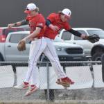 Kenais Centrals Jacob Joanis and Braden Smith celebrate a victory over Soldotna on Monday, April 28, 2025, at the Soldotna Little League fields in Soldotna, Alaska. (Photo by Jeff Helminiak/Peninsula Clarion)