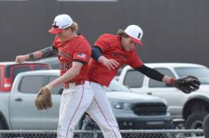 Kenai's Central's Jacob Joanis and Braden Smith celebrate a victory over Soldotna on Monday, April 28, 2025, at the Soldotna Little League fields in Soldotna, Alaska. (Photo by Jeff Helminiak/Peninsula Clarion)