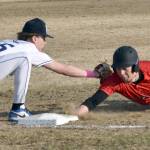 Soldotnas Brenden Theel tags out Kenai Centrals Keoni Beddow on Monday, April 28, 2025, at the Soldotna Little League fields in Soldotna, Alaska. (Photo by Jeff Helminiak/Peninsula Clarion)