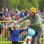 Attendees gather to dance and to listen during a performance by Blackwater Railroad Company, part of the Levitt AMP Soldotna Music Series on Wednesday, June 7, 2023, at Soldotna Creek Park. (Jake Dye/Peninsula Clarion)