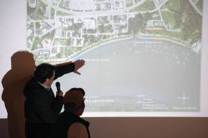 Jake Dye/Peninsula Clarion
Project Manager Jerrod Stafford, of Western Marine Construction, points to a map of the Kenai River Bluff Stabilization Project while giving an update on the project in Kenai on Wednesday.