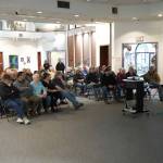 Leif Hammes, from the Chief Civil Works Project Management Section of the Army Corps of Engineers Alaska District, takes questions about the Kenai River Bluff Stabilization Project while giving an update on the project in Kenai, Alaska, on Wednesday, April 30, 2025. (Jake Dye/Peninsula Clarion)