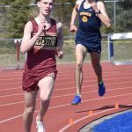 Grace Christians Robbie Annett leads Homers Johannes Bynagle on the way to victory in the 800-meter run at the SoHi Invite on Saturday, May 3, 2025, at Soldotna High School in Soldotna, Alaska. (Photo by Jeff Helminiak/Peninsula Clarion)