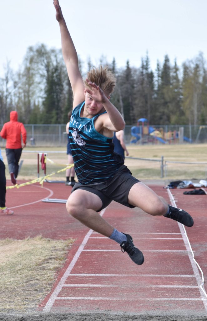 Nikiskis Ethan Ellis competes in the long jump at the SoHi Invite on Saturday, May 3, 2025, at Soldotna High School in Soldotna, Alaska. (Photo by Jeff Helminiak/Peninsula Clarion)