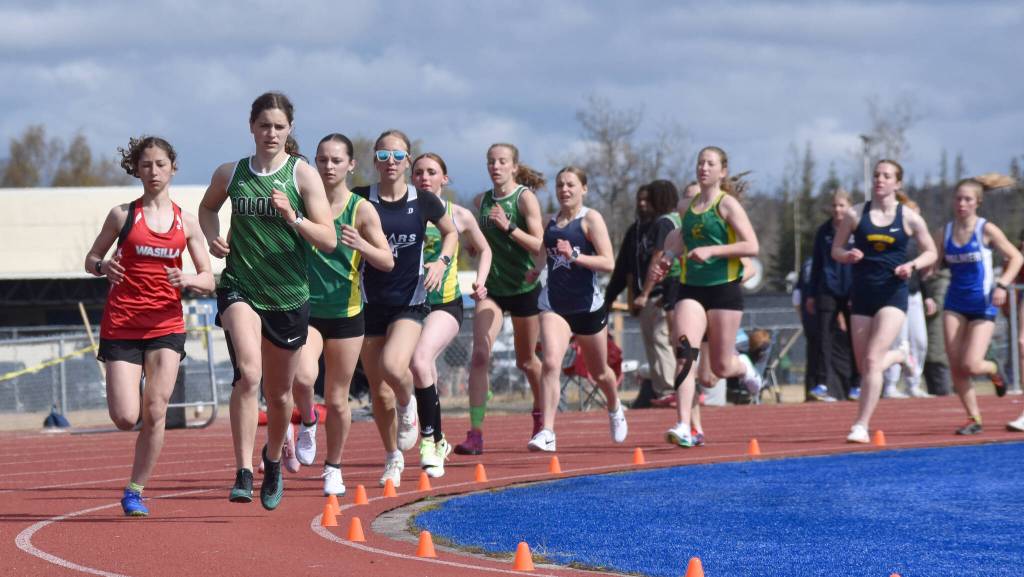 Colonys Ella Hopkins leads the 1,600-meter run at the SoHi Invite on Saturday, May 3, 2025, at Soldotna High School in Soldotna, Alaska. (Photo by Jeff Helminiak/Peninsula Clarion)