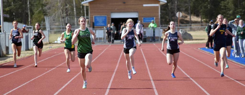 Colonys Annelise Larsen wins the 400-meter dash at the SoHi Invite on Saturday, May 3, 2025, at Soldotna High School in Soldotna, Alaska. (Photo by Jeff Helminiak/Peninsula Clarion)