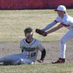 Kenai Centrals Everett Chamberlain tags out Homers Henry Wedvik in a rundown Friday, May 9, 2025, at the Kenai Little League fields in Kenai, Alaska. (Photo by Jeff Helminiak/Peninsula Clarion)