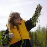 Sterling Elementary School students collect trash from the banks of the Kenai River near Bings Landing in Sterling, Alaska, during the 10th Annual Kenai River Spring Cleanup on Wednesday, May 14, 2025. (Jake Dye/Peninsula Clarion)