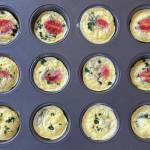 These high-protein egg bites are filled with tomatoes, parsley and feta, but any omelet-appropriate toppings will do. (Photo by Tressa Dale/Peninsula Clarion)