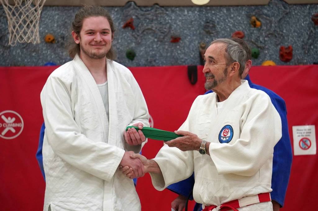 Cayden Kelly is recognized for his promotion to senior green belt at the Sterling Judo Clubs end of season awards night at Sterling Elementary School in Sterling, Alaska, on Thursday, May 15, 2025. (Jake Dye/Peninsula Clarion)