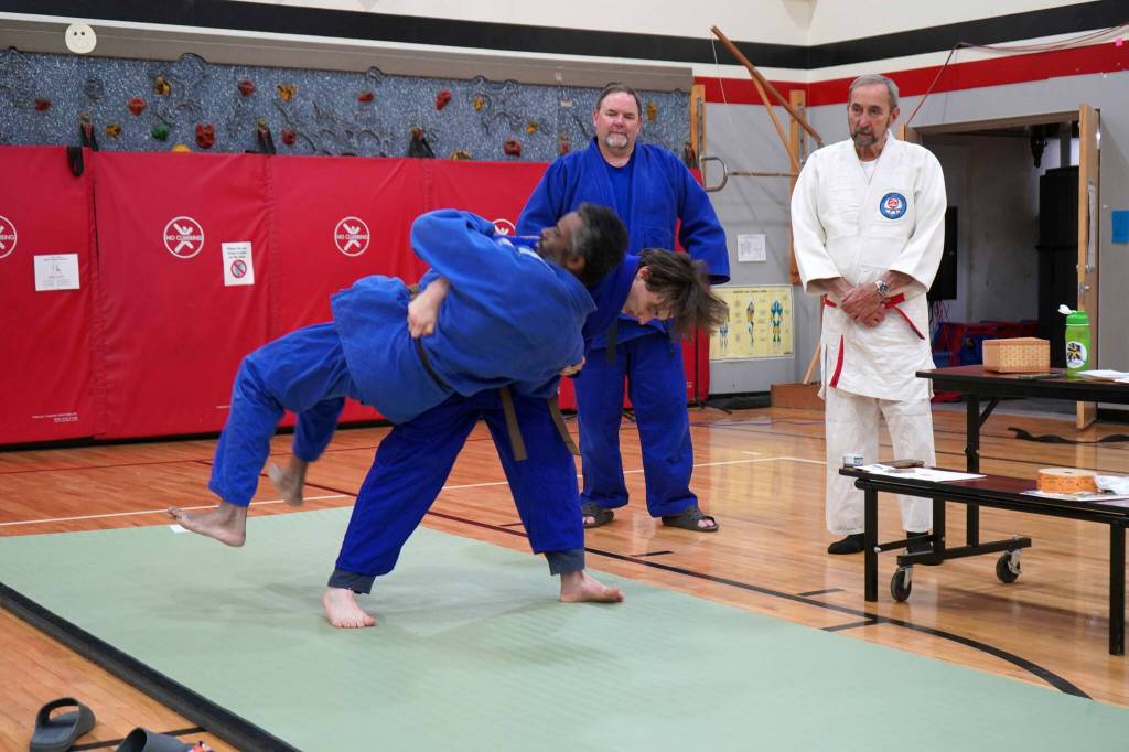 River Fairbanks demonstrates a throw against one of his teammates at the Sterling Judo Clubs end of season awards night at Sterling Elementary School in Sterling, Alaska, on Thursday, May 15, 2025. (Jake Dye/Peninsula Clarion)