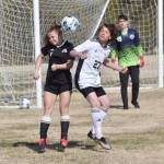 Nikiskis Jayden Anderson and Kenai Centrals Diego Huerta battle for the ball Friday, May 16, 2025, at Nikiski Middle-High School in Nikiski, Alaska. (Photo by Jeff Helminiak/Peninsula Clarion)