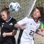 Nikiski's Jayden Anderson and Kenai Central's Diego Huerta battle for the ball Friday, May 16, 2025, at Nikiski Middle-High School in Nikiski, Alaska. (Photo by Jeff Helminiak/Peninsula Clarion)