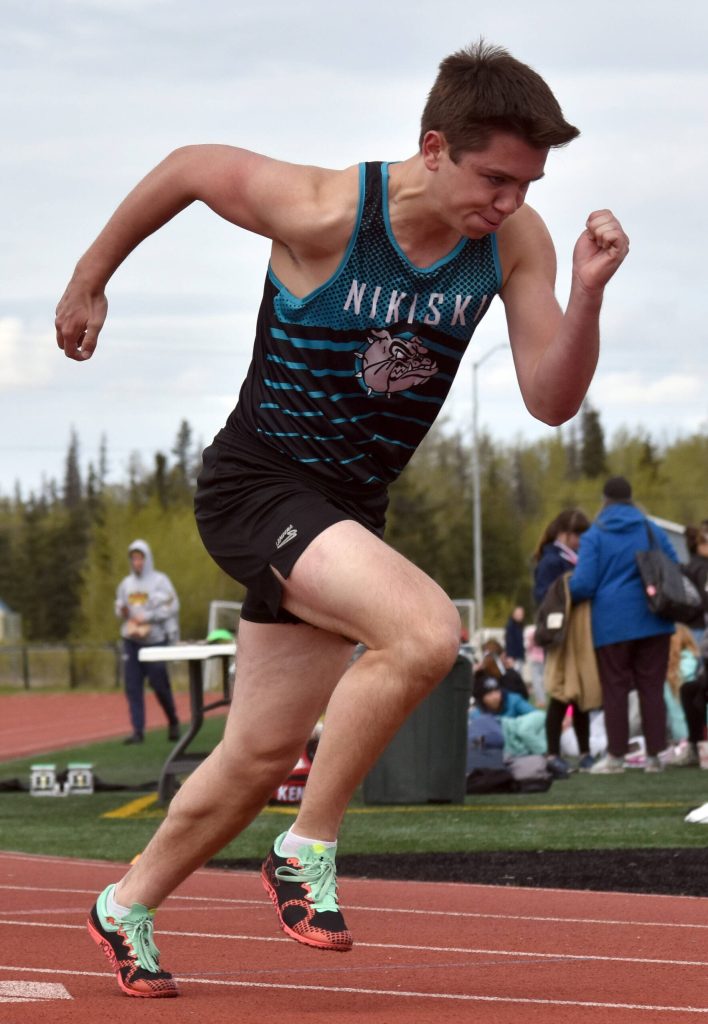 Nikiskis Ryder Maguire starts in the 400-meter dash Saturday, May 17, 2025, at the Kenai Peninsula Borough meet at Ed Hollier Field at Kenai Central High School in Kenai, Alaska. (Photo by Jeff Helminiak/Peninsula Clarion)