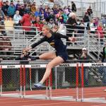 Homers Gracie Miotke wins the 100-meter hurdles Saturday, May 17, 2025, at the Kenai Peninsula Borough meet at Ed Hollier Field at Kenai Central High School in Kenai, Alaska. (Photo by Jeff Helminiak/Peninsula Clarion)