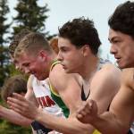 The boys 100-meter dash field bolts from the starting blocks Saturday, May 17, 2025, at the Kenai Peninsula Borough meet at Ed Hollier Field at Kenai Central High School in Kenai, Alaska. (Photo by Jeff Helminiak/Peninsula Clarion)
