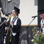 Kyler Allen, Kaleb Allen, Oliver Parrish and Kaden Parrish perform Life is a Highway during a commencement ceremony at Nikiski/Middle High School in Nikiski, Alaska, on Monday, May 19, 2025. (Jake Dye/Peninsula Clarion)