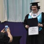 Lydia Dyer accepts the Masonic Student of Excellence award at the River City Academy graduation ceremony Tuesday, May 20, 2025, at Skyview Middle School just outside of Soldotna, Alaska. (Photo by Jeff Helminiak/Peninsula Clarion)