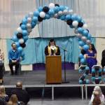 Ashlynn Parkin, co-valedictorian, delivers a speech at the River City Academy graduation ceremony Tuesday, May 20, 2025, at Skyview Middle School just outside of Soldotna, Alaska. (Photo by Jeff Helminiak/Peninsula Clarion)