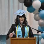 Aubrey White, salutatorian, delivers a speech at the River City Academy graduation ceremony Tuesday, May 20, 2025, at Skyview Middle School just outside of Soldotna, Alaska. (Photo by Jeff Helminiak/Peninsula Clarion)