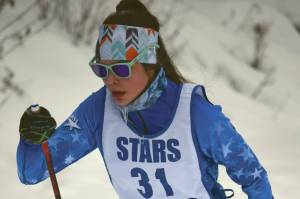 Soldotna's Erika Arthur skis to victory Saturday, Feb. 20, 2021, at the second day of Kenai Peninsula Borough ski meet at Tsalteshi Trails just outside of Soldotna, Alaska. (Photo by Jeff Helminiak/Peninsula Clarion)