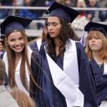 Graduates of Soldotna High School prepare to receive their diplomas on the schools football field in Soldotna, Alaska, on Wednesday, May 21, 2025. (Jake Dye/Peninsula Clarion)