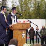 Valedictorian Scott Powell and Salutatorian James Innes deliver an address during the Soldotna High School graduation ceremony on the schools football field in Soldotna, Alaska, on Wednesday, May 21, 2025. (Jake Dye/Peninsula Clarion)