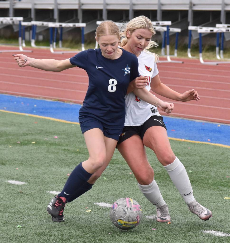 Soldotnas Keely Sundberg and Kenai Centrals Brynnen Hanson battle for the ball Thursday, May 22, 2025, at Justin Maile Field at Soldotna High School in Soldotna, Alaska. (Photo by Jeff Helminiak/Peninsula Clarion)