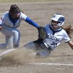 Soldotna's Aliya Blough gets back to first ahead of the tag of Palmer's Rylei Doyle on Saturday, May 24, 2025, at the Soldotna Little League fields in Soldotna, Alaska. (Photo by Jeff Helminiak/Peninsula Clarion)