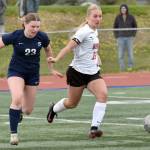 Soldotna's Jillian Duncan and Kenai Central's Kate Wisnewski battle for the ball Thursday, May 22, 2025, at Justin Maile Field at Soldotna High School in Soldotna, Alaska. (Photo by Jeff Helminiak/Peninsula Clarion)