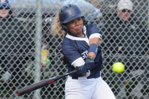 Soldotna’s Isabelle Cruz hits the ball against Kodiak during a winner’s bracket game of the Northern Lights Conference tournament Friday, May 30, 20205 at Baranof Field in Kodiak, Alaska. (DEREK CLARKSTON/Kodiak Daily Mirror)