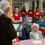 Soldotna Mayor Paul Whitney presents a commendation to Hanna Stormo during her 102nd birthday party at Aspen Creek Senior Living in Soldotna, Alaska, on Friday, May 30, 2025. (Jake Dye/Peninsula Clarion)