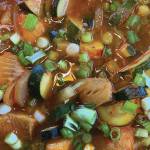 This version of maeuntang, or Korean fishermans stew, features sablefish, daikon, zucchini and green onions with fermented Korean bean and red pepper pastes. (Photo by Tressa Dale/Peninsula Clarion)