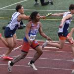 Soldotnas Lokeni Wong and Tyce Escott cant quite complete a pass on their third try. The pair made the exchange on the next try and the Stars went on to take second in the 400-meter relay Saturday, May 31, 2025, at the Division I state track meet at Dimond High School in Anchorage, Alaska. (Photo by Jeff Helminiak/Peninsula Clarion)