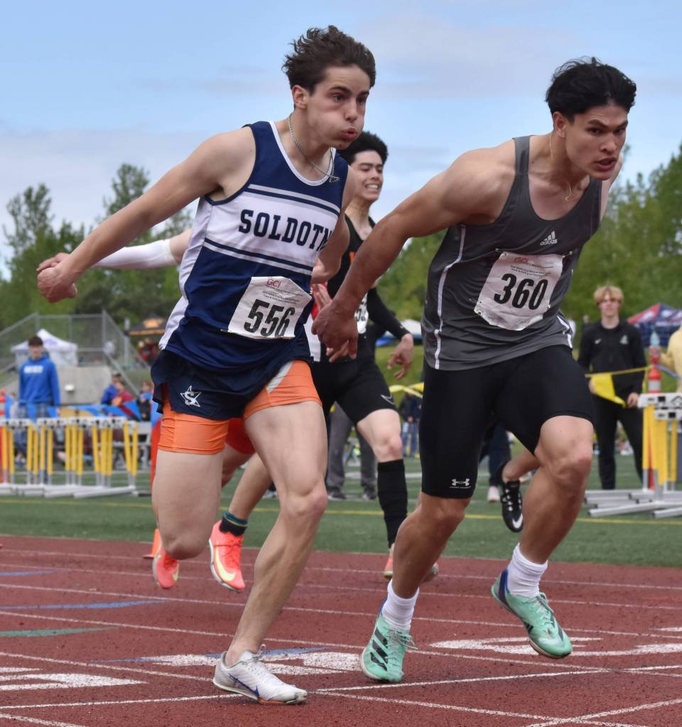 Ketchikans Jason Lorig nips Soldotnas Tyce Escott in the 100-meter dash Saturday, May 31, 2025, at the Division I state track meet at Dimond High School in Anchorage, Alaska. The race was a showdown between two of the top three 100 runners in Alaska prep history. (Photo by Jeff Helminiak/Peninsula Clarion)