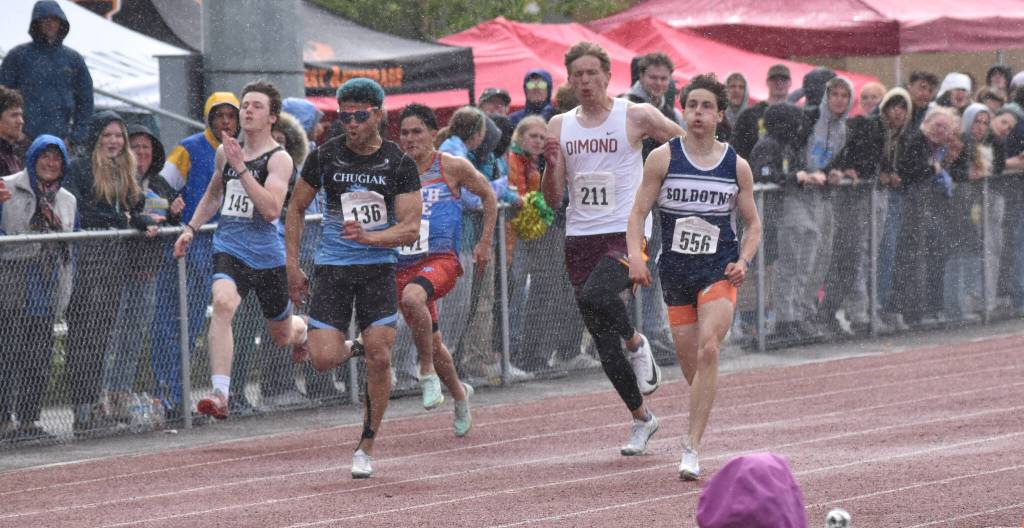 Soldotnas Tyce Escott wins the 200-meter dash in a driving rain Saturday, May 31, 2025, at the Division I state track meet at Dimond High School in Anchorage, Alaska. (Photo by Jeff Helminiak/Peninsula Clarion)