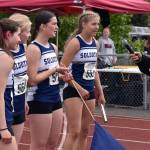 Soldotnas Shiloh Zichko, Sophia Jedlicki, Anaulie Sedivy and Sarah Brown inform the announcer they also set a school record after winning a state title in the 400-meter relay Saturday, May 31, 2025, at the Division I state track meet at Dimond High School in Anchorage, Alaska. (Photo by Jeff Helminiak/Peninsula Clarion)