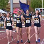Homers 3,200-relay team of Claira Booz, Etta Bynagle, Vera Bates and Beatrix McDonough won and state a new state record Saturday, May 31, 2025, at the Division II state track meet at Dimond High School in Anchorage, Alaska. (Photo by Jeff Helminiak/Peninsula Clarion)