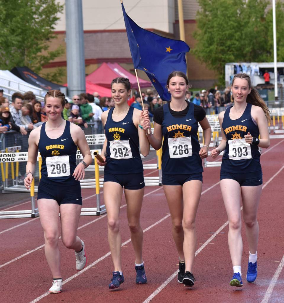 Homers 3,200-relay team of Claira Booz, Etta Bynagle, Vera Bates and Beatrix McDonough won and state a new state record Saturday, May 31, 2025, at the Division II state track meet at Dimond High School in Anchorage, Alaska. (Photo by Jeff Helminiak/Peninsula Clarion)