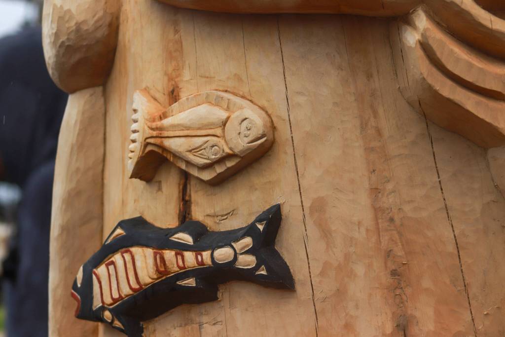 The Fishermans Honor Totem Pole is unveiled in Hoonah on Friday, May 30, 2025. (Jasz Garrett / Juneau Empire)