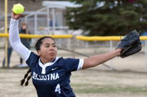 Soldotna's Isabelle Cruz delivers to Kenai Central on Tuesday, May 6, 2025, at the Soldotna Little League fields in Soldotna, Alaska. (Photo by Jeff Helminiak/Peninsula Clarion)