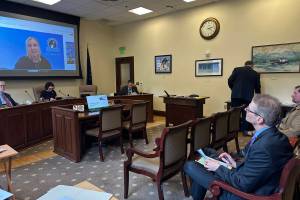 Juneau School District Superintendent Frank Hauser watches Deena Bishop, commissioner of the Alaska Department of Education and Early Development, discuss the federal disparity test for education funding provided by states during a Senate Education Committee meeting Wednesday, May 14, 2025. (Mark Sabbatini / Juneau Empire file photo)